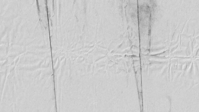 Crumpled grey paper with fold lines stain stop motion animation.