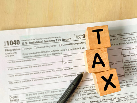 U.S. Federal Income Tax Return Form with TAX Blocks