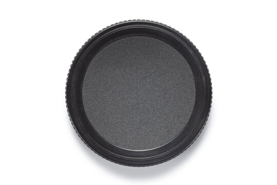 Black plastic lid of jar isolated on white background, Top view