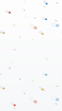 Colorful pills scattered on white background. 2d animation
