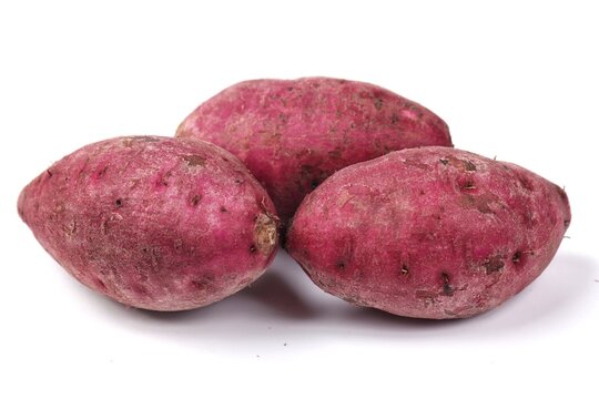  purple sweet potato or ubi ungu with naturally vibrant purple flesh and a mildly sweet flavor.