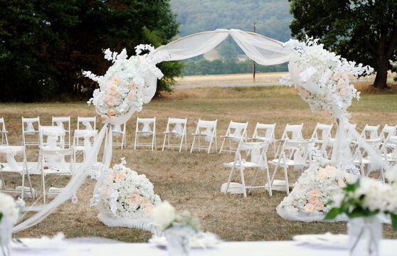 Table decoration and flowers at an outdoor wedding