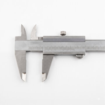 Generic precision stainless steel marking vernier caliper with carbide scriber jaws isolated on white.