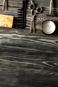 Tools for cutting beard barbershop top view on wooden background