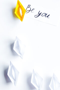 choice concept paper boats on white background top view