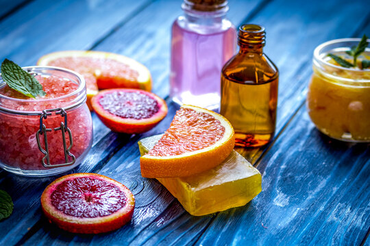 organic cosmetic with citrus on blue background