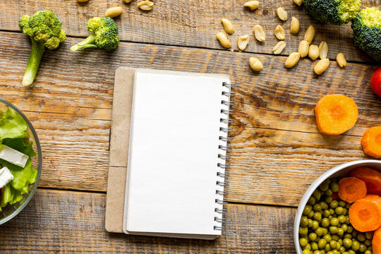 concept diet, slimming plan with vegetables top view mock up