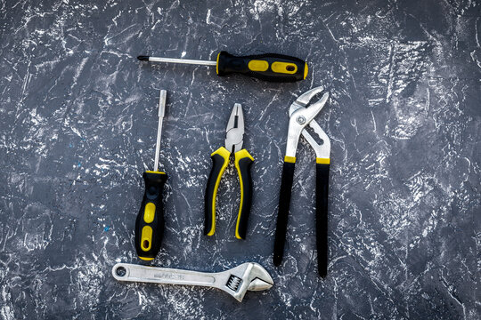 Tools for repairing top view on stone background