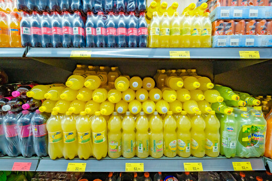 Beldibi, Turkey &ndash; april 30, 2025: sweet carbonated drinks in bottles on supermarket shelves