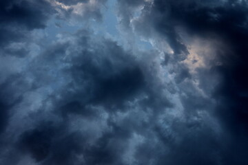 Obraz premium Dark sky with rain clouds, autumn rainy weather, storm clouds in the sky, dark dramatic clouds with rain clouds, storm 