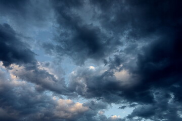 Obraz premium Dark sky with rain clouds, autumn rainy weather, storm clouds in the sky, dark dramatic clouds with rain clouds, storm 