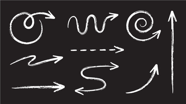 Hand drawn chalk arrow set on black background