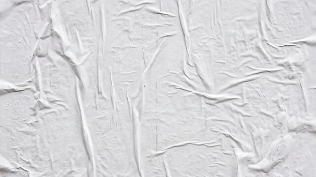 Crumpled white glued paper texture background