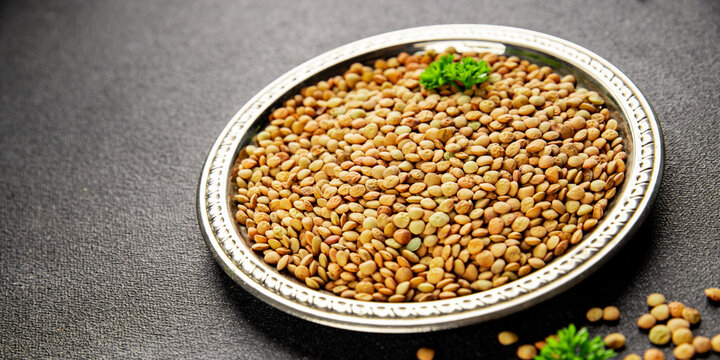 Green lentils raw grains appetizer food preparation vegetable dish tasty snack fresh and delicious gourmet rustic food background on the table  rustic food top view copy space keto and paleo dietsand 