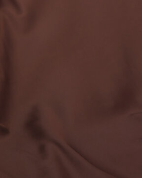 Vertical warm brown and terracotta silk satin fabric background