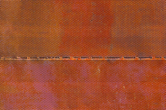 Textured Surface with Hexagonal Pattern and Metal Seam