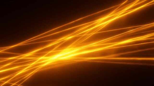 Abstract Orange Light Trails Forming Intersecting Lines on a Dark Black Background