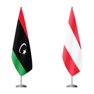 Libya and Austria flags on flagpoles for official ceremonies and meetings, transparent background vector