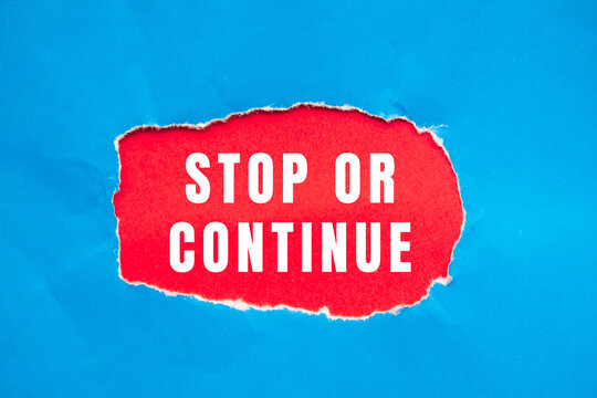 Stop or Continue text concept photo