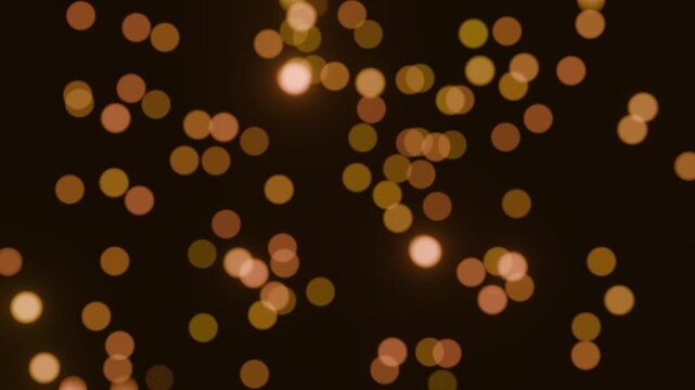 Abstract Golden Bokeh Light Background with Soft Glowing Circles, 4K Loop