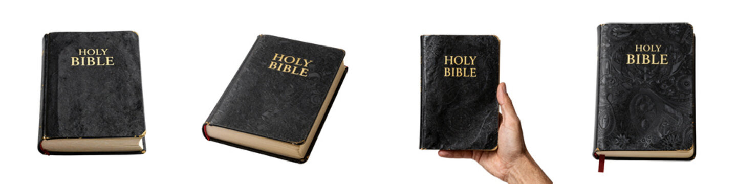 Arrangement of holy bibles with black covers and gold lettering on a black background