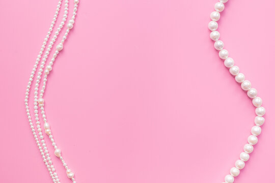 Natural white pearls - beads for jewelry, top view. Precious and elegance concept background