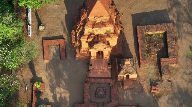 Aerial drone view of Po Sah Inu Cham Towers at sunrise in Phu Thuy, Lam Dong, Vietnam, highlighting ancient Cham architecture and cultural heritage in the morning light.