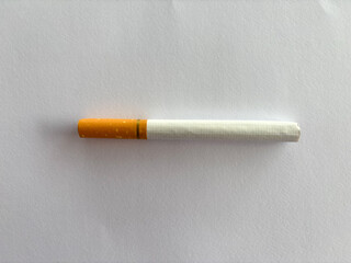 Single Cigarette on White Background © FrameByte