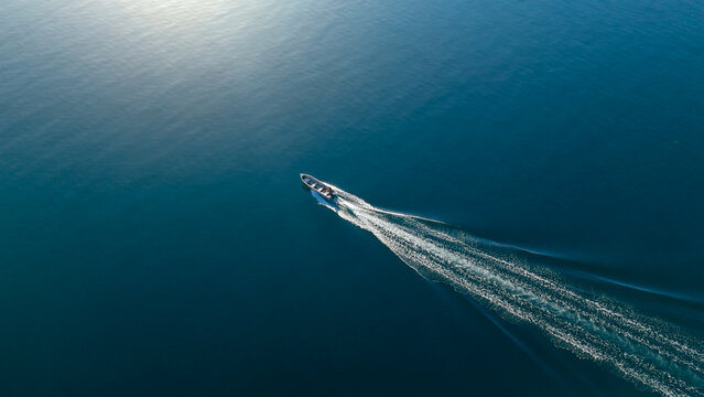 Aerial view of the speed boat moving in the sea