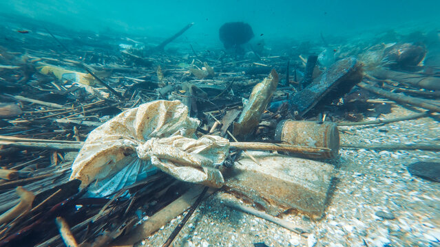 Underwater view of the garbage on the sea bed near the island of Ilha Grande in Brazil