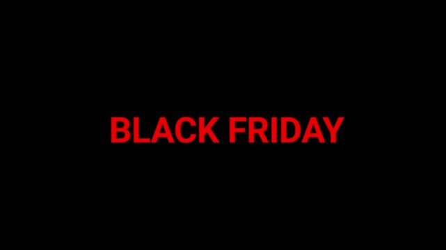 Black Friday text in vibrant red neon glows against a dark backdrop to highlight the biggest shopping day of the year for consumers.