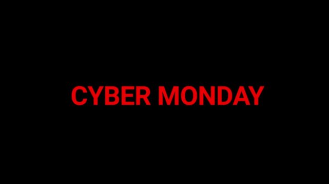 Cyber Monday text in bright red neon lights appears on a black background to signify the start of a major online shopping extravaganza.
