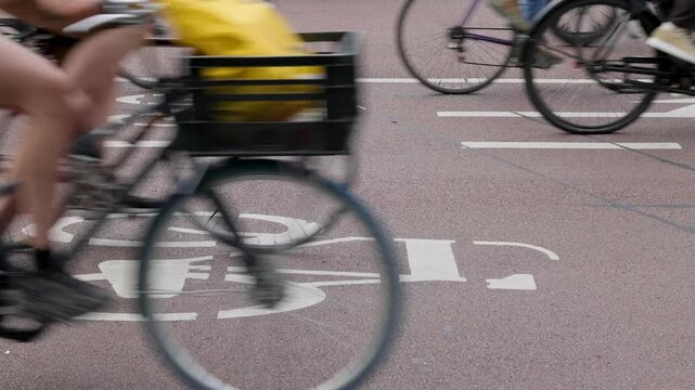 Dutch cyclists on a bicycle lane during rush hour in Utrecht, The Netherlands
