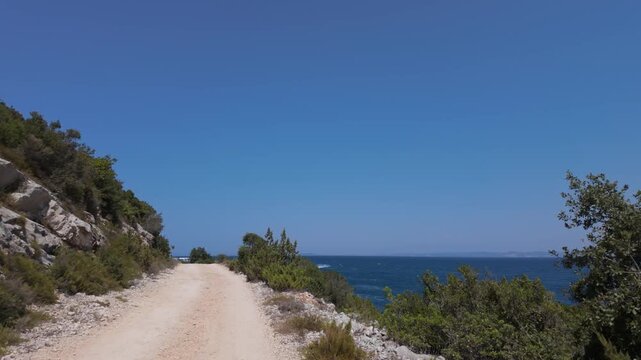 Walking on the scenic offroad route of Karaburun peninsula