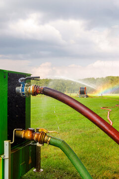 Dutch irrigation pump with sprinkler on farmland during drought in Overijssel, The Netherlands