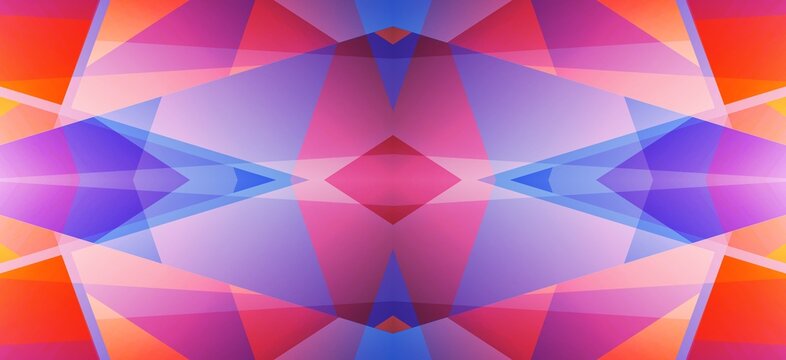 Vibrant geometric abstract background featuring overlapping colorful triangles with soft gradients in a symmetrical digital design