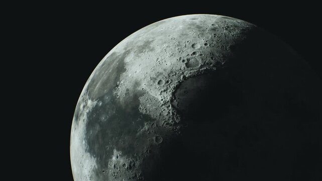 The moons surface details are highlighted against a dark sky, showcasing its craters and textures during a clear night. The celestial body radiates beauty and mystery.