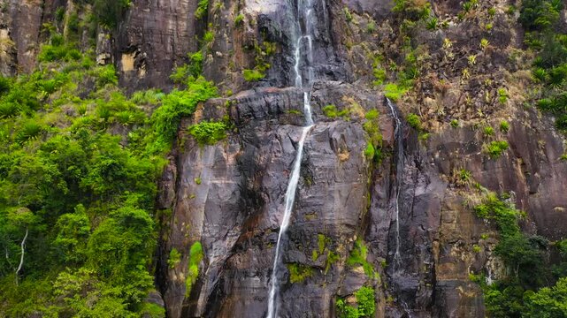 Aerial view of Bambarakanda Falls. Waterfall in the tropical mountain jungle. Sri Lanka.