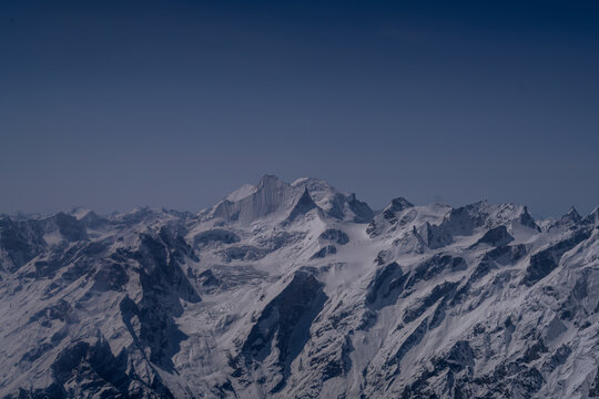 Aerial view of the snow-capped peaks of the Himalayas range in Gilgit, Pakistan.