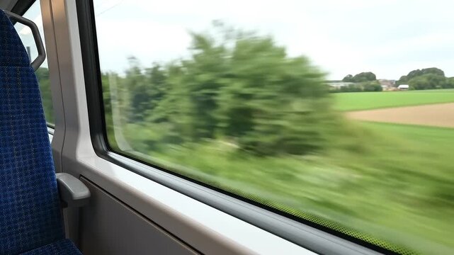 Blurred Scenery Through Train Window