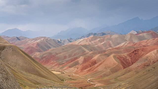 Scenic and colorful mountain landscape view of Gulcha valley on overcast summer afternoon, Osh, Kyrgyzstan