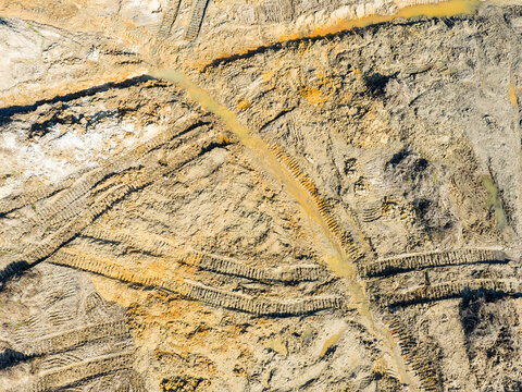 Wheel tracks on the ground on the dirt road.Wheel tracks on the ground on the dirt road.