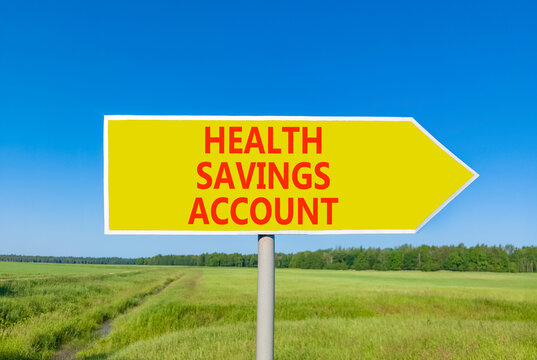 Health saving account symbol. Concept words Health saving account on beautiful yellow road sign. Beautiful blue sky green grass background. Medical Health saving account concept. Copy space.