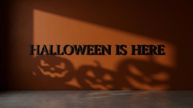 Halloween is here text projection with spooky glowing jack o lantern pumpkins on a dark wall