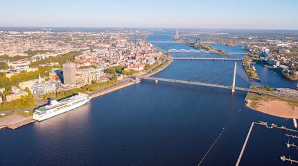 Obraz premium Panorama of Riga from a drone. In the background a large white ship, Riga Port, Old Town. (Series)