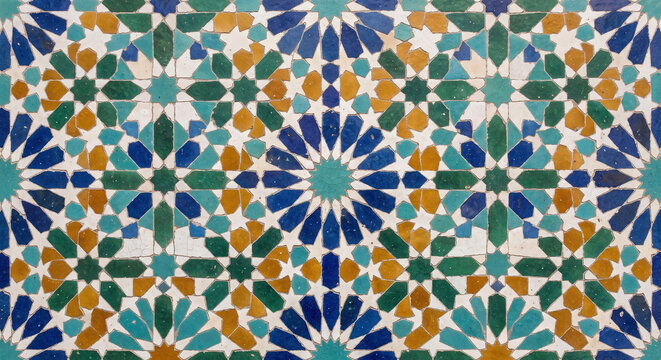 Traditional geometric zellige mosaic tilework in vibrant blue green and yellow