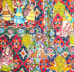 Naklejka premium Traditional Indian folk art painting featuring rural village lifestyle, festive bhangra dancers, and vibrant ethnic patterns.