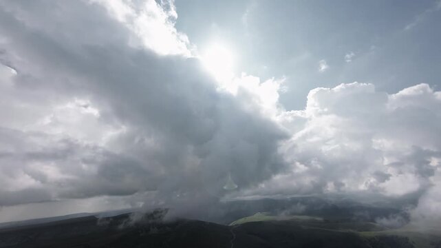 Aerial Timelapse of Rolling Hills and Plateau with Moving Clouds