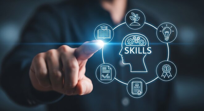 Businessman pointing at holographic head graphic with skills icons representing personal development business development
