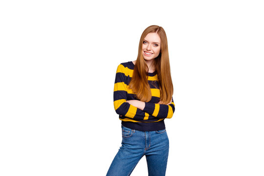 Portrait of cheerful excited pretty attractive beautiful cute lovely tender gentle girl wearing striped yellow black pullover posing with folded hands isolated on gray background copy-space